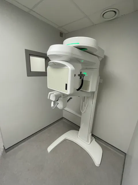 Dental cone beam CT imaging unit.
