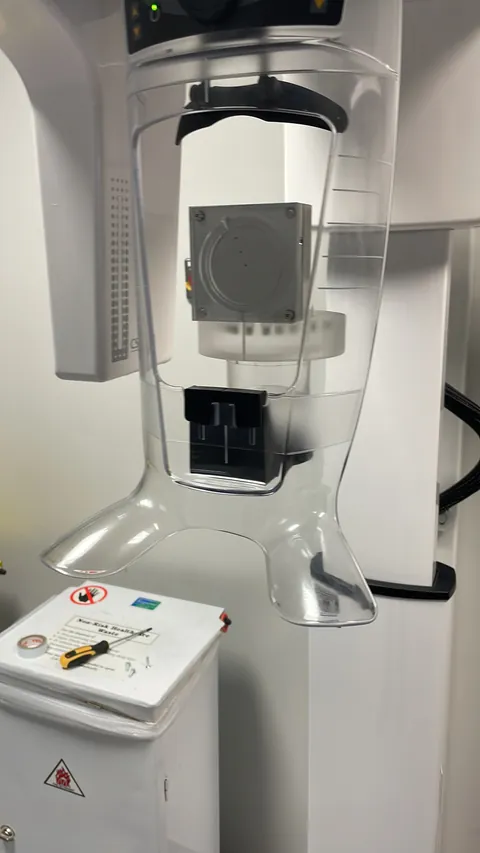 Patient positioning components of a dental panoramic imaging unit.